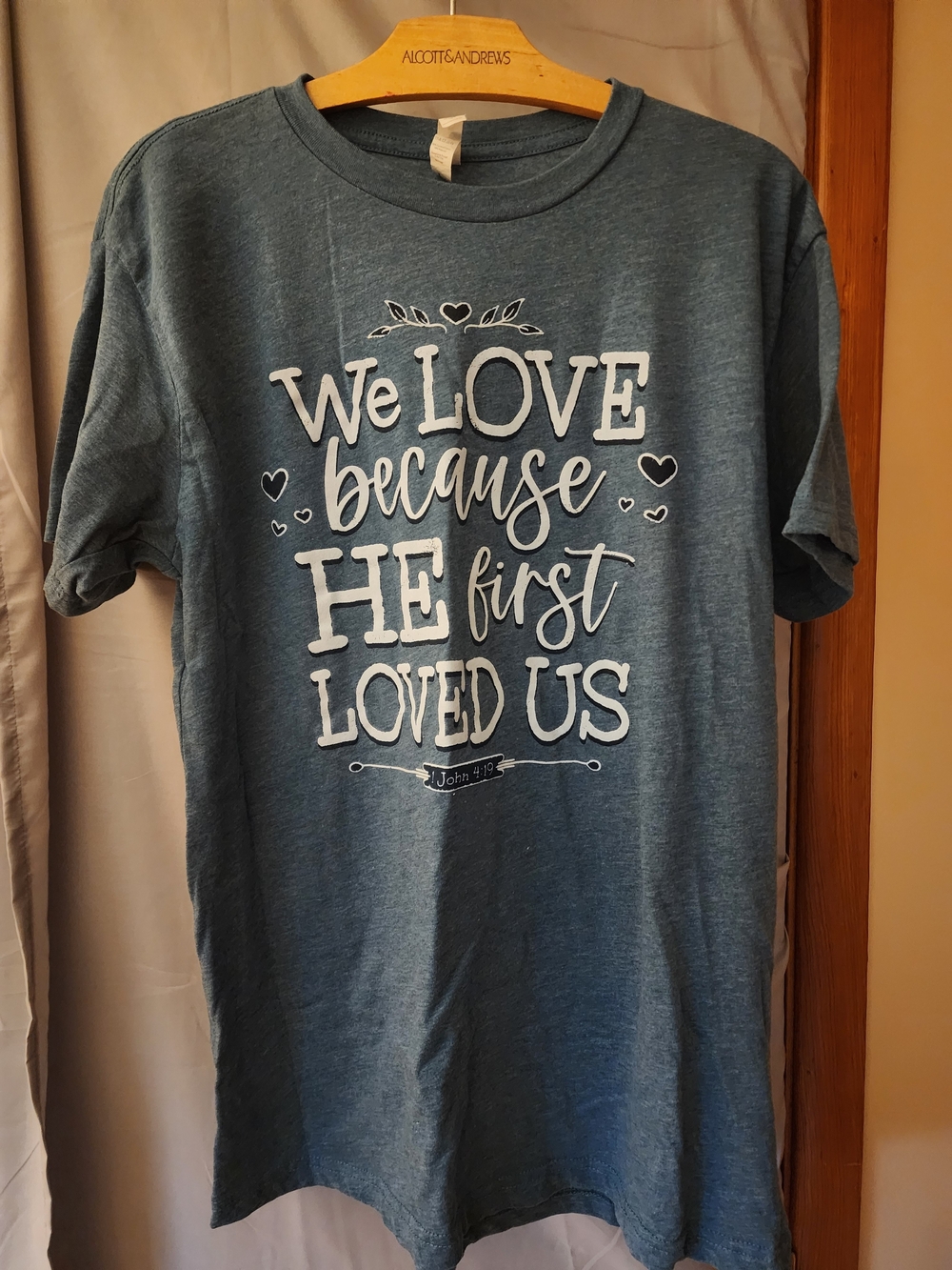 Christian Graphic Tee "We Love Because He First Loved Us" - Blue